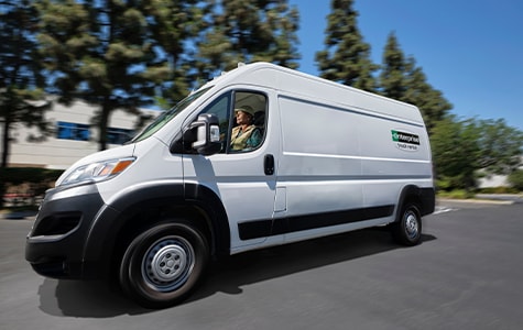 Two people discussing trucks